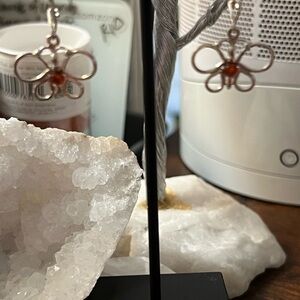 Brand new without tags. Butterfly Earrings with Amber center gemstone.